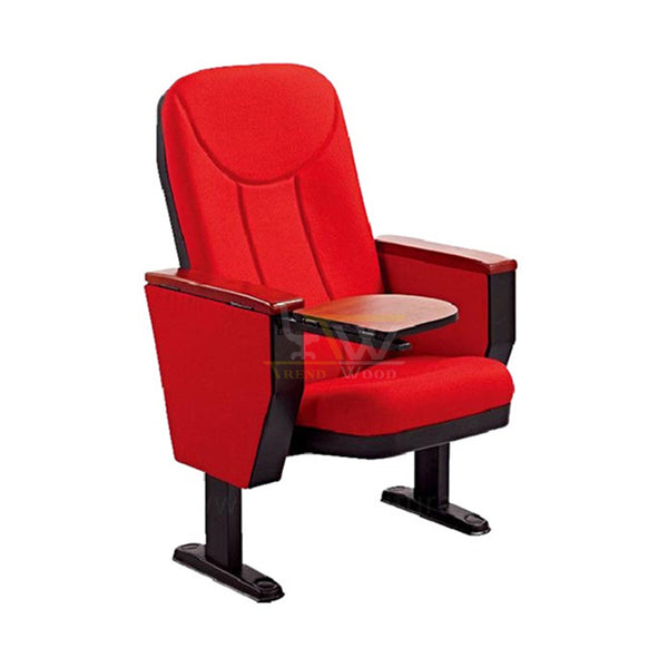 Red auditorium chair with foldable writing pad and strong black legs.