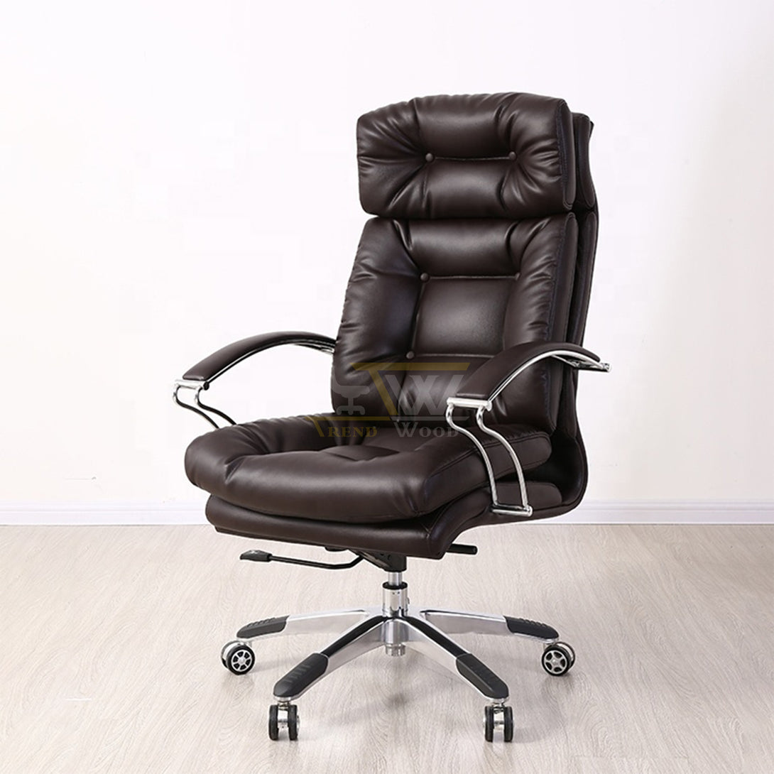 Luxury executive swivel chair in black with PU padded armrests and high-density foam for ergonomic seating in Karachi offices.