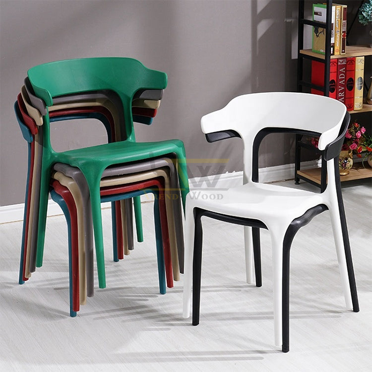 Stack of modern cafe chairs in assorted colors by TrendWood - trendy and comfortable seating for restaurants and cafes in Pakistan.