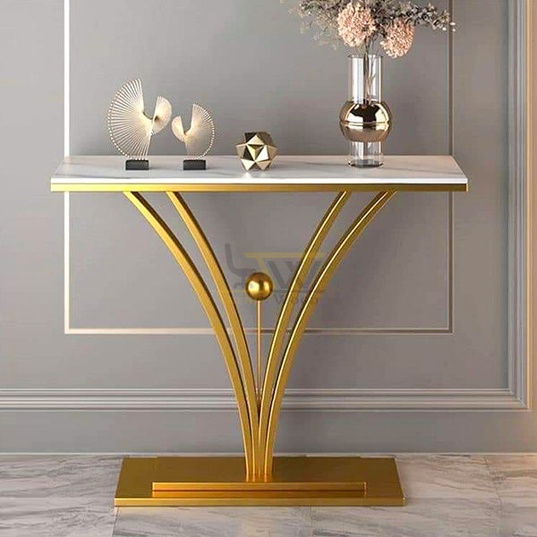 Refined Trendwood golden console table with marble top, epitomizing luxury living in Karachi